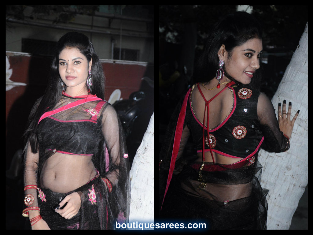 nivisha in black  net saree