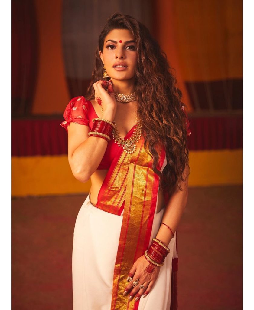 traditional red and white bengali saree